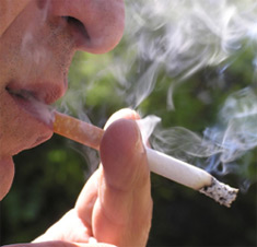 male smoker enjoying a cigarette